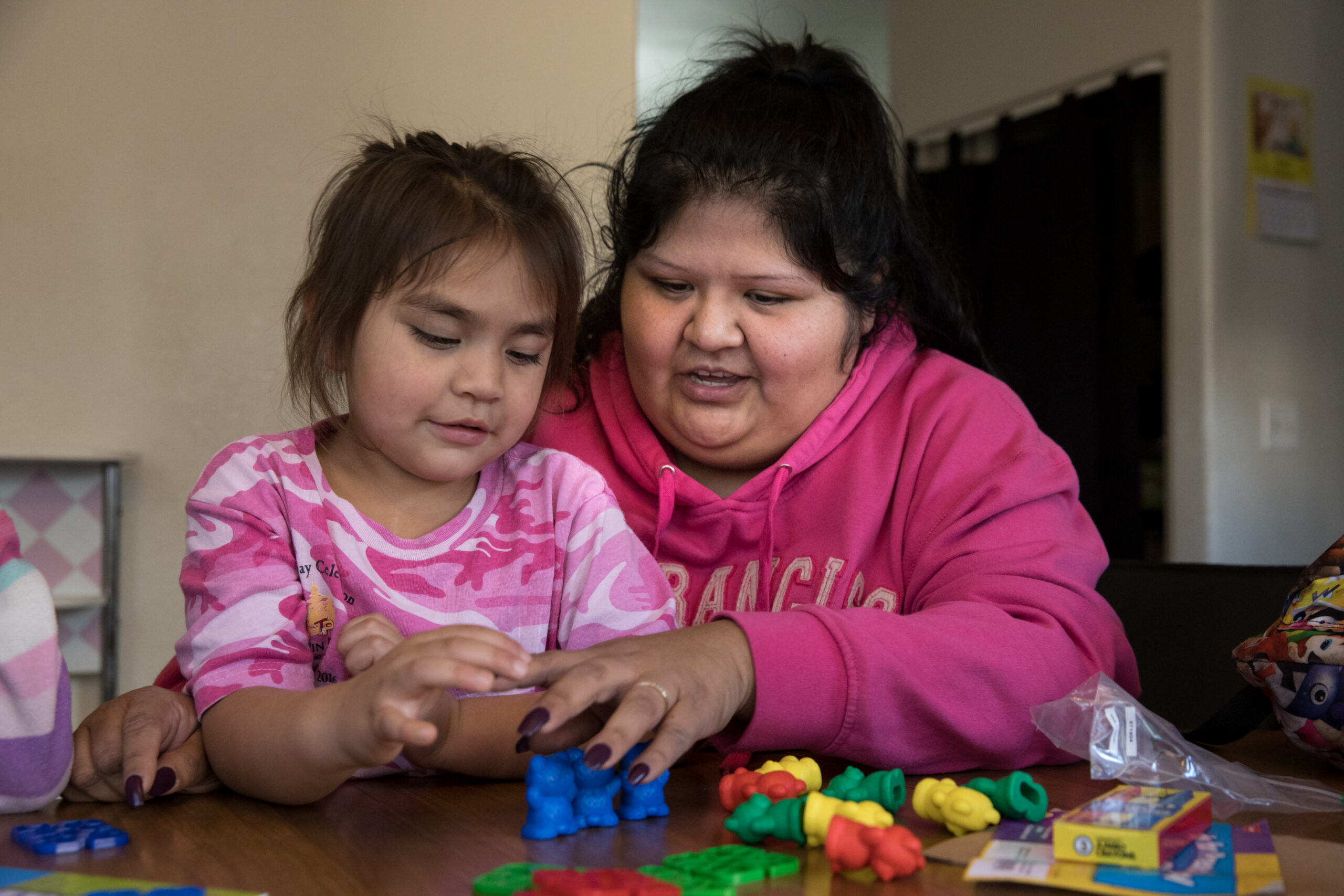 Arry James, 3, left, a Lytton Head Start student, plays with her mother, Meleaine James (Yes, that's how she spells her first name), right, in their home in Santa Rosa, CA on November 30, 2016. Photograph by Erin Lubin