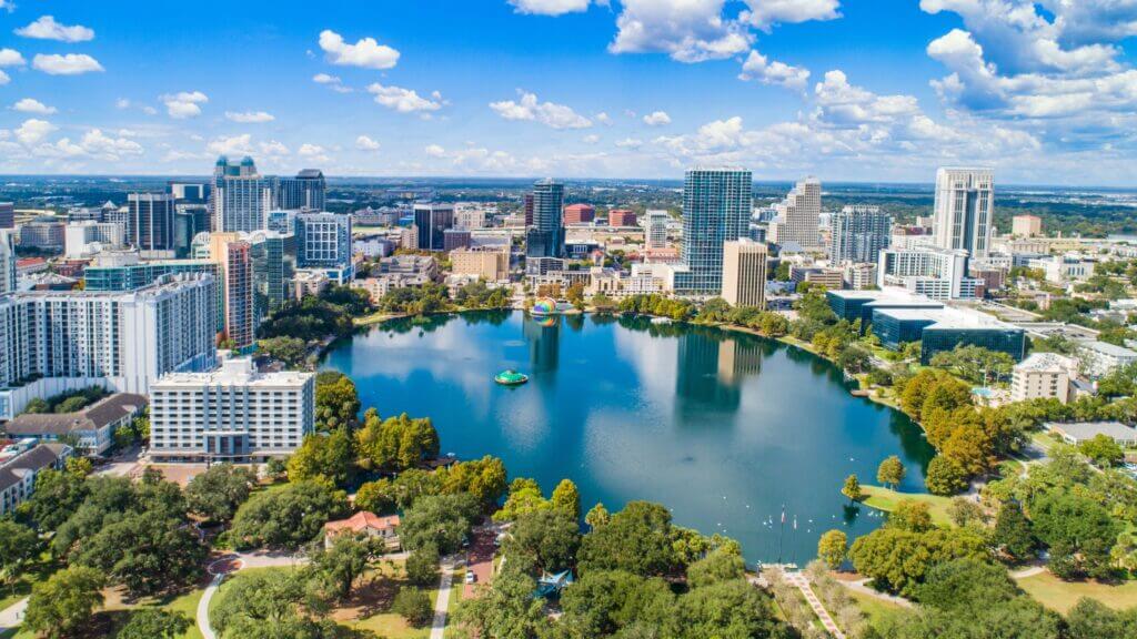 high altitude view looking down at Orlando Florida skyline with water