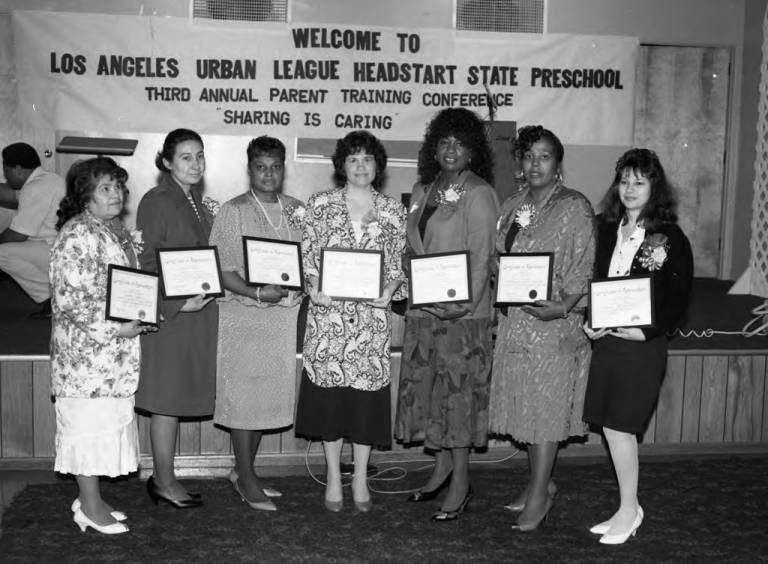 Urban League Head Start event participants holding certificates, Los Angeles, 1988 Urban League Head Start, Los Angeles, CA, 1988